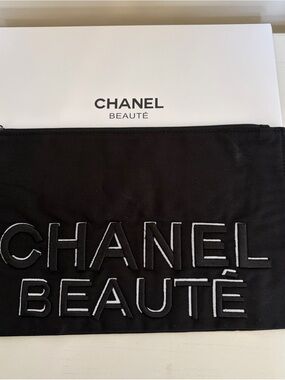 Authentic CHANEL Black Cosmetic Pouch with White Embroidered Logo & Box